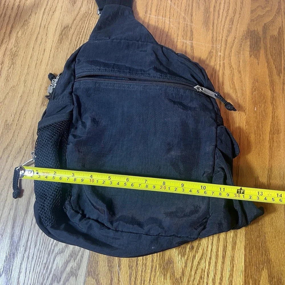 Baggallini Black Sling Bag Adjustable Crossbody Strap Zipper Accent Travel Purse